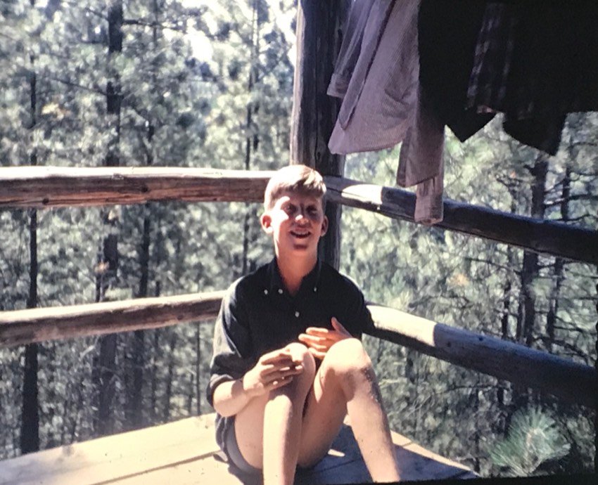 Jonathan on a cabin porch